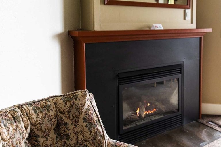Gas fireplace and cozy chair